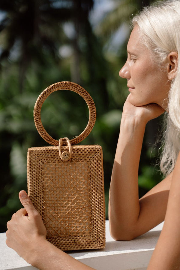 Model holding Jenn Lee Positano Box Bag